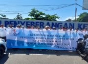 Bersama Polisi Jaga Jalur Penyeberangan di Pelabuhan Rakyat Pokmas Kelautan Banyuwangi Dukung WWF ke -10