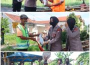 Rayakan Idul Adha, Polwan Polres Pasuruan Berbagi Daging Hewan Kurban untuk Penjaga Perlintasan Kereta