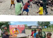 Pasukan TNI Bangkitkan Semangat Anak-Anak Krepkuri Dengan Bermain Bola Voli