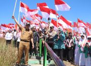 Sambut Hari Kemerdekaan RI ke 79, Polres Bondowoso bersama Pemkab Kibarkan 1.000 Bendera Merah Putih di Kawah Wurung