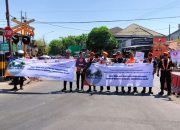 Harlantas Bhayangkara ke-69, Polres Pelabuhan Tanjungperak Gandeng PT KAI Daop 8 Sosialisasikan Keselamatan di Perlintasan Sebidang