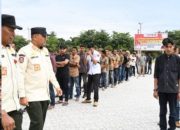 1.352 Linmas Diserahkan ke Polres Aceh Timur Bantu Pengamanan Pilkada