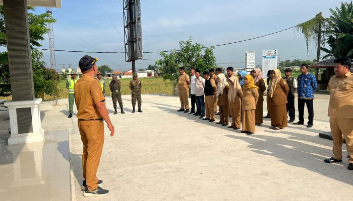 Kades Amak Gozal Pimpin Apel Siaga Kesiapan Pilkada Serentak 2024, Sukseskan Pilkada Jaga Kondusifitas