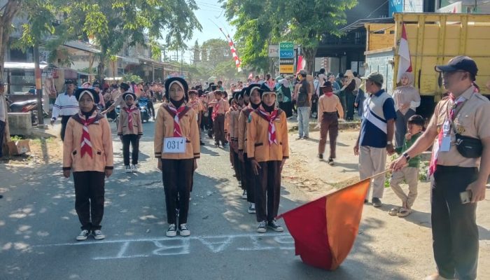 Gerak Jalan Pramuka Arjasa Meriah, 184 Peserta Ramaikan HUT Pramuka ke-64 dan HUT RI ke-80