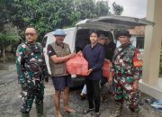 Koramil 08 Lemah Abang Bersama SPPG Sertajaya Salurkan Bantuan Gizi untuk Korban Banjir Jatibaru